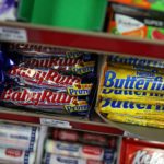 SAN FRANCISCO, CA - FEBRUARY 18: Nestle Butterfinger and Baby Ruth candy bars are displayed on a shelf at a convenience store on February 18, 2015 in San Francisco, California. Nestle USA announced plans to remove all artificial flavors and FDA-certified colors from its entire line of chocolate candy products, including the popular Butterfinger and Baby Ruth candy bars, by the end of 2015.
