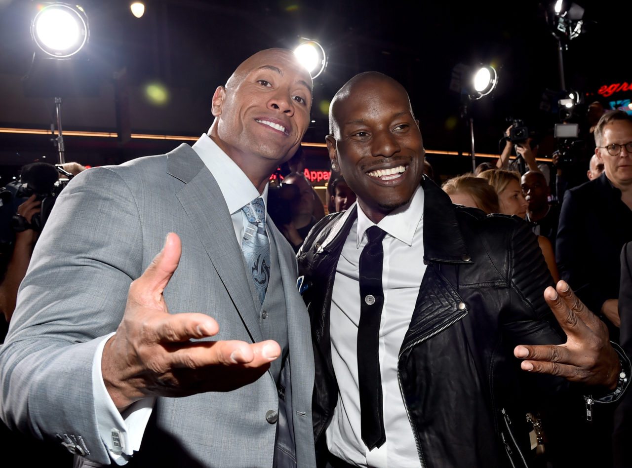 HOLLYWOOD, CA - APRIL 01: Actor Dwayne 'The Rock' Johnson (L) and recording artist/actor Tyrese Gibson attend Universal Pictures' "Furious 7" premiere at TCL Chinese Theatre on April 1, 2015 in Hollywood, California.