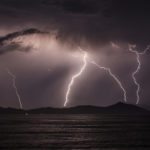 KOS, GREECE - JUNE 03: Lightning strikes over the Greek Island of Pserimos on June 03, 2015 in Kos, Greece. Migrants are continuing to arrive on the Greek Island of Kos from Turkey who's shoreline lies approximately 5 Km away. Around 30,000 migrants have entered Greece so far in 2015, with the country calling for more help from its European Union counterparts.