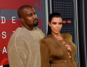 LOS ANGELES, CA - AUGUST 30: Singer Kayne West (L) and TV personality Kim Kardashian attend the 2015 MTV Video Music Awards at Microsoft Theater on August 30, 2015 in Los Angeles, California.