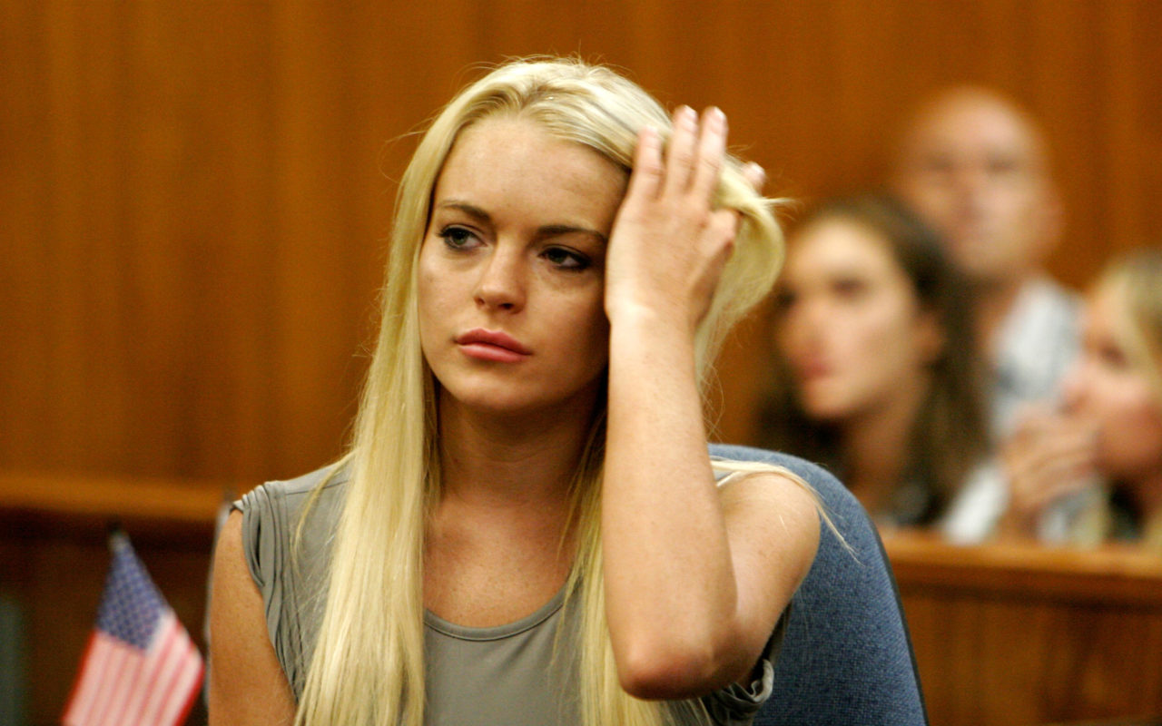 BEVERLY HILLS, CA - JULY 20: Actress Lindsay Lohan surrenders at the Beverly Hills Courthouse to serve her 90 day jail sentence on July 20, 2010 in Beverly Hills, California. Lindsay Lohan was found in violation of her probation for the August 2007 no-contest plea to drug and alcohol charges stemming from two separate traffic accidents.