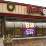 DES PLAINES, IL - DECEMBER 13: A man enters a Wendy's restaurant December 13, 2002 in Des Plaines, Illinois. Owner Diageo PLC, the world's largest liquor company, has finalized the sale of Wendy's competitor Burger King to a private consortium led by Texas Pacific in a deal worth $1.5 billion USD. (Photo by Tim Boyle/Getty Images)