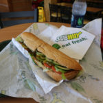 MIAMI, FL - OCTOBER 21: A Subway sandwich is seen in a restaurant as the company announced a settlement over a class-action lawsuit that alleged that Subway engaged in deceptive marketing for its 6-inch and 12-inch sandwiches and served customers less food than they were paying for on October 21, 2015 in Miami, Florida. While it denies the claims, Subway said that franchisees would be required to have a measurement tool in stores to make sure loaves are 12-inches.