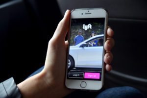 SAN FRANCISCO, CA - FEBRUARY 03: The Lyft app is seen on a passenger's phone on February 3, 2016 in San Francisco, California. (Photo by Mike Coppola/Getty Images for Lyft)