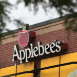CHICAGO, IL - AUGUST 10: An Applebee's restaurant serves customers on August 10, 2017 in Chicago, Illinois. DineEquity, the parent company of Applebee's and IHOP, plans to close up to 160 restaurants in the first quarter of 2018. The announcement helped the stock climb more than 4 percent today.