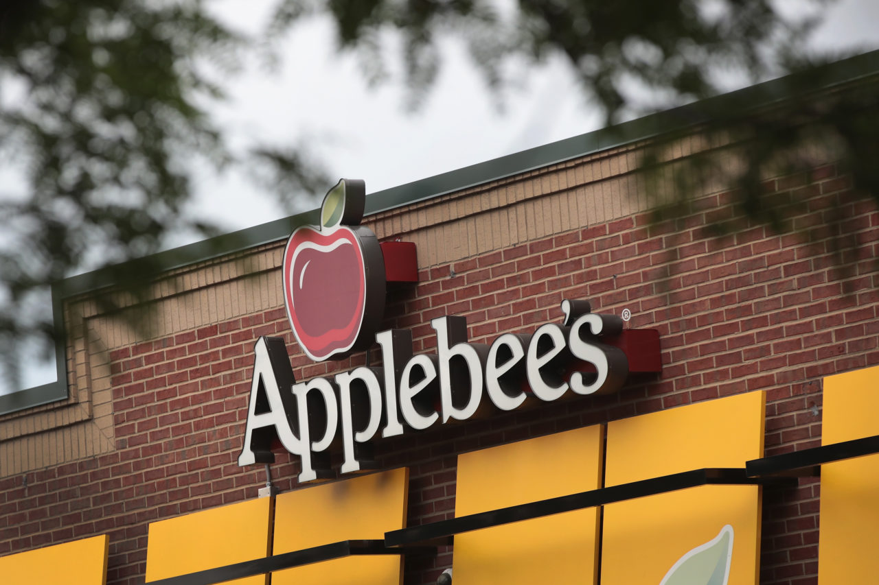 CHICAGO, IL - AUGUST 10: An Applebee's restaurant serves customers on August 10, 2017 in Chicago, Illinois. DineEquity, the parent company of Applebee's and IHOP, plans to close up to 160 restaurants in the first quarter of 2018. The announcement helped the stock climb more than 4 percent today.