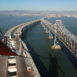 OAKLAND, CA - AUGUST 29: Catwalks hang over a section of the newly constructed eastern span of the San Francisco-Oakland Bay Bridge during a media tour of the self-anchored suspension span tower on August 29, 2011 in Oakland, California. Contruction crews have erected twelve foot wide catwalks that connect to the San Francisco-Oakland Bay Bridge self-anchored suspension span's tower and crews will begin to lay the nearly one mile of main cable beginning in early 2012. The bridge has been under constrution since 2002 with an estimated price tag of $6.3 billion and will have the world's tallest Self-Anchored Suspension (SAS) tower once completed.