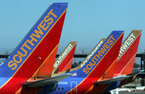 OAKLAND, CA - JULY 11: The tail sections of a Southwest Airlines planes are seen at the Oakland International Airport July 11, 2005 in Oakland, California. Southwest Airlines, the nation's largest discount carrier, reported a 7.9 percent increase in passenger traffic, boarding 6.89 million passengers in June. (Photo by Justin Sullivan/Getty Images)