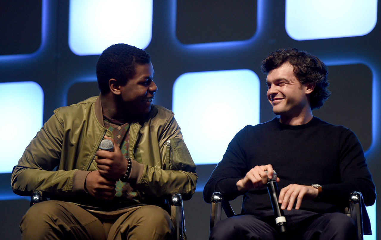 LONDON, ENGLAND - JULY 17: John Boyega (L) and Alden Ehrenreich, who will play Han Solo, on stage during Future Directors Panel at the Star Wars Celebration 2016 at ExCel on July 17, 2016 in London, England.