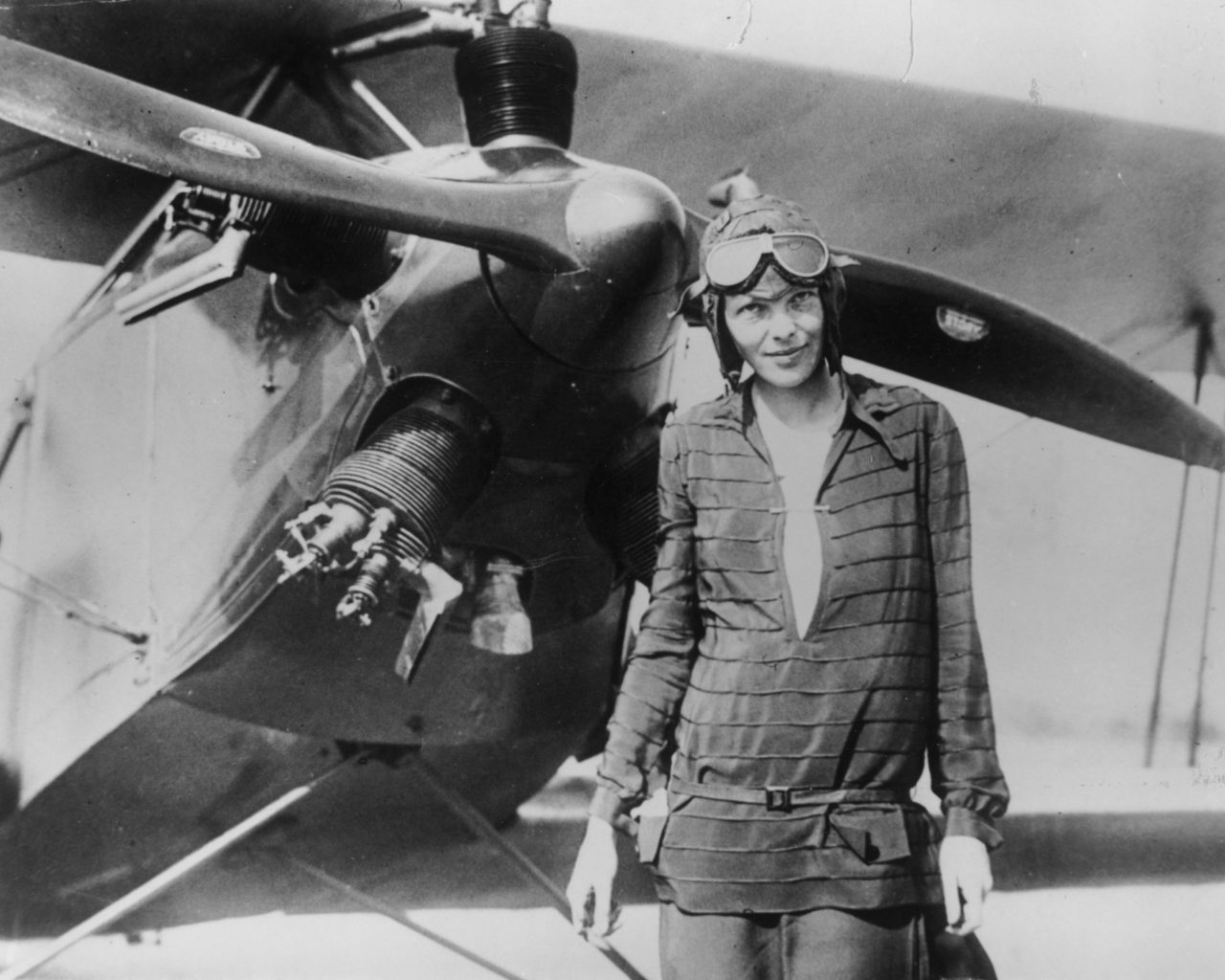 394033 03: (FILE PHOTO) Amelia Earhart stands June 14, 1928 in front of her bi-plane called "Friendship" in Newfoundland. Carlene Mendieta, who is trying to recreate Earhart's 1928 record as the first woman to fly across the US and back again, left Rye, NY on September 5, 2001. Earhart (1898 - 1937) disappeared without trace over the Pacific Ocean in her attempt to fly around the world in 1937. (Photo by Getty Images)