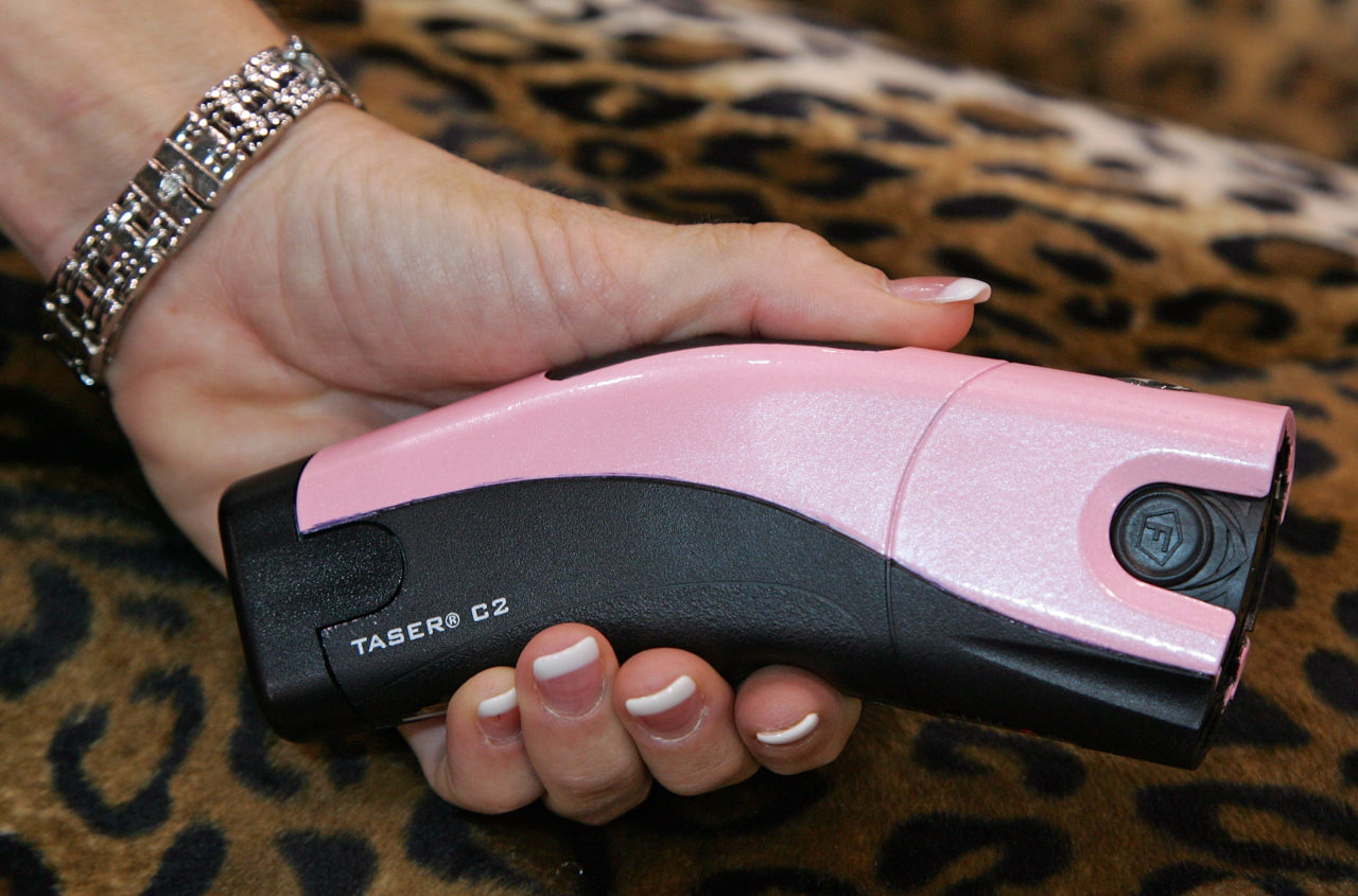 LAS VEGAS - JANUARY 09: A new pink Taser C2 by Taser International Inc. is displayed at the 2008 International Consumer Electronics Show at the Las Vegas Convention Center January 9, 2008 in Las Vegas, Nevada. The company introduced new fashionable colors for the personal protection devices to appeal to women. CES, the world's largest annual consumer technology trade show, runs through tomorrow and features 2,700 exhibitors showing off their latest products and services to more than 140,000 attendees. (Photo by Ethan Miller/Getty Images)