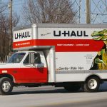 MORTON GROVE, IL - JANUARY 23: A U-Haul truck departs from a U-Haul store January 23, 2003 in Morton Grove, Illinois. Reno, Nevada-based U-Haul Co. is discussing debt restructuring. (Photo by Tim Boyle/Getty Images)