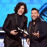LOS ANGELES, CA - FEBRUARY 10: Dan Smyers (L) and Shay Mooney of Dan + Shay speak onstage during the 61st Annual GRAMMY Awards at Staples Center on February 10, 2019 in Los Angeles, California. (Photo by Kevin Winter/Getty Images for The Recording Academy)