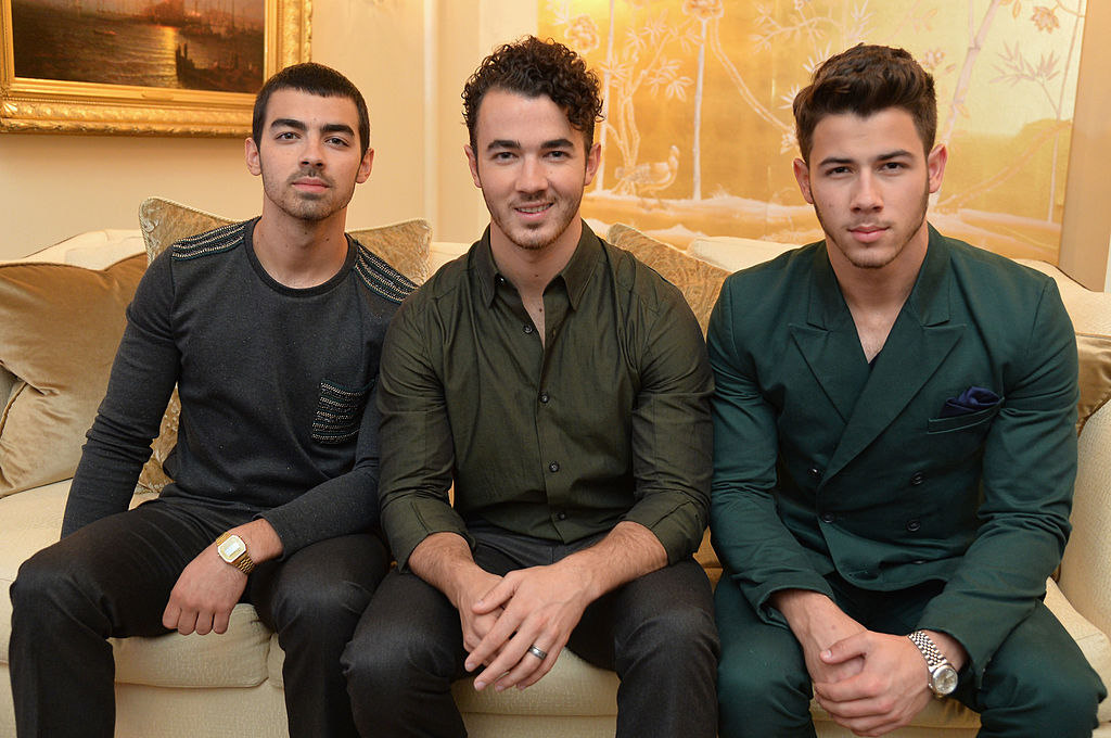 NEW YORK, NY - SEPTEMBER 05: (L-R) Joe Jonas, Kevin Jonas, and Nick Jonas of the Jonas Brothers attend the Mercedes-Benz Star Lounge during Mercedes-Benz Fashion Week Spring 2014 at Lincoln Center on September 5, 2013 in New York City. (Photo by Mike Coppola/Getty Images for Mercedes-Benz)