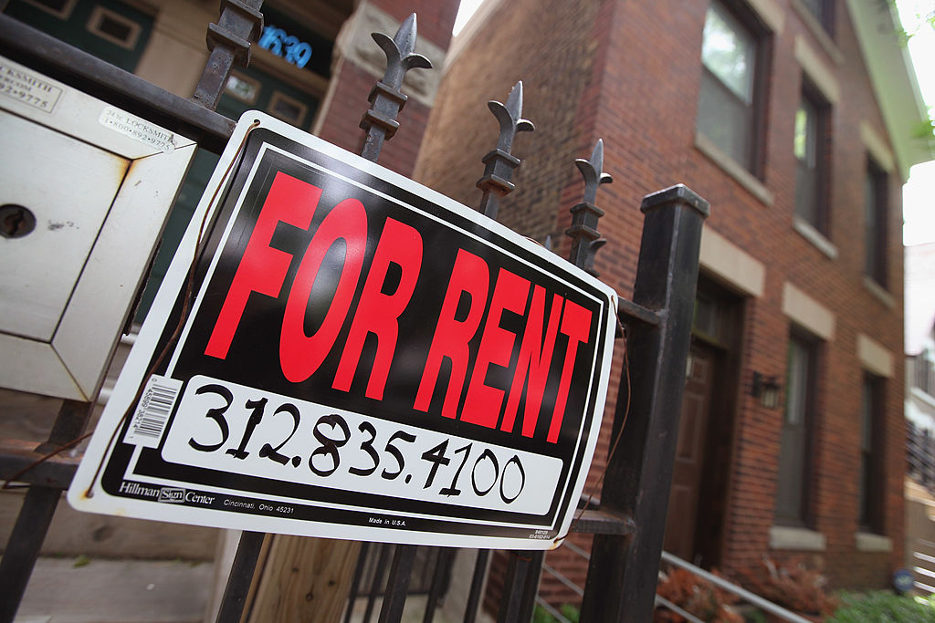CHICAGO, IL - MAY 31: A "For Rent" sign stands in front of a house on May 31, 2011 in Chicago, Illinois. According to the Standard & Poor's Case-Shiller Home Price Index home prices fell in March in 18 of the 20 metropolitan areas monitored by the index, reaching their lowest levels since the housing bubble burst in 2006. In Chicago, were nearly 30 percent of homes offered for sale are bank owned, prices have fallen 7.6 percent from a year ago. (Photo by Scott Olson/Getty Images)