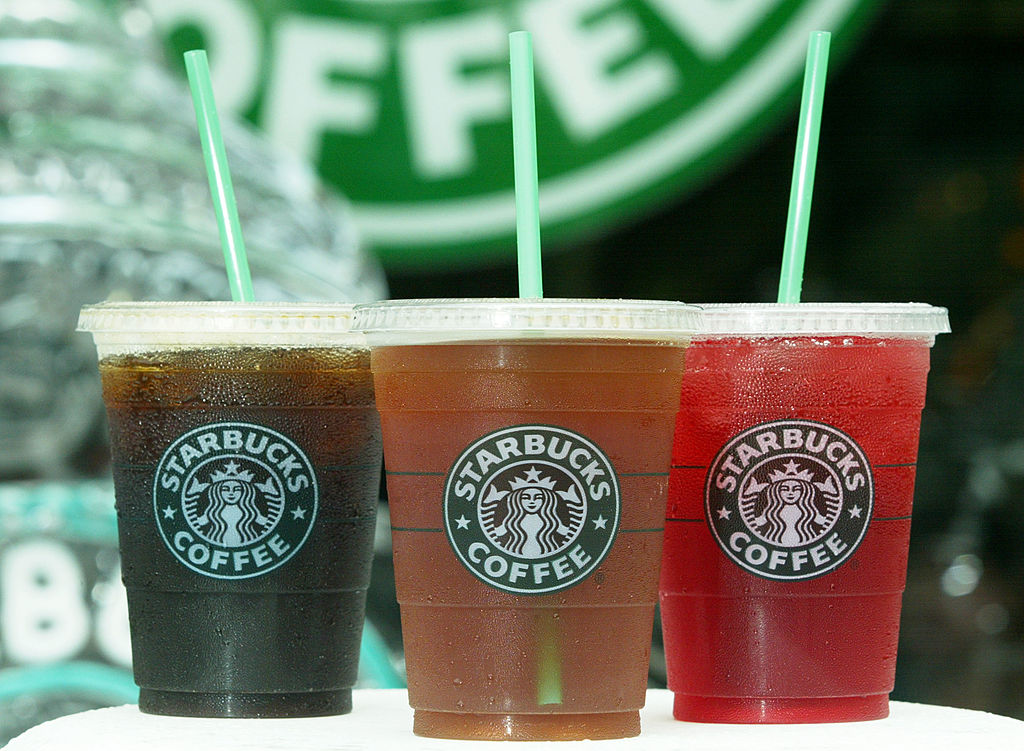 WASHINGTON - JULY 2: Starbucks' new iced coffee and tea beverages are displayed during a promotion July 2, 2003 outside a Starbucks coffee shop at Dupont Circle in Washington, DC. Starbucks introduced a new line of iced tea, coffee and tea lemonade drinks to their customers to cool down in the summer. (Photo by Alex Wong/Getty Images)