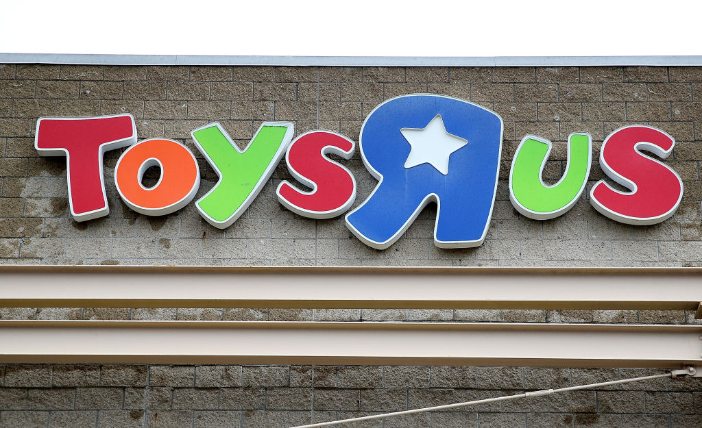 EMERYVILLE, CA - MARCH 15: The Toys R Us logo is displayed on the exterior of a store on March 15, 2018 in Emeryville, California. Toys R Us filed for liquidation in a U.S. Bankruptcy court and plans to close 735 stores leaving 33,000 workers without employment. (Photo by Justin Sullivan/Getty Images)