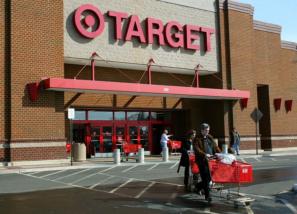 ALEXANDRIA, VA - FEBRUARY 20: Shoppers leave a Target store February 20, 2003 in Alexandria, Virginia. Target announced a modest four percent increase in profit for the fourth quarter of 2002. (Photo by Mark Wilson/Getty Images)