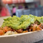 MIAMI, FL - MARCH 05: Guacamole sits on a dish at a Chipotle restaurant on March 5, 2014 in Miami, Florida. The Mexican fast food chain is reported to have tossed around the idea that it would temporarily suspend sales of guacamole due to an increase in food costs. (Photo by Joe Raedle/Getty Images)