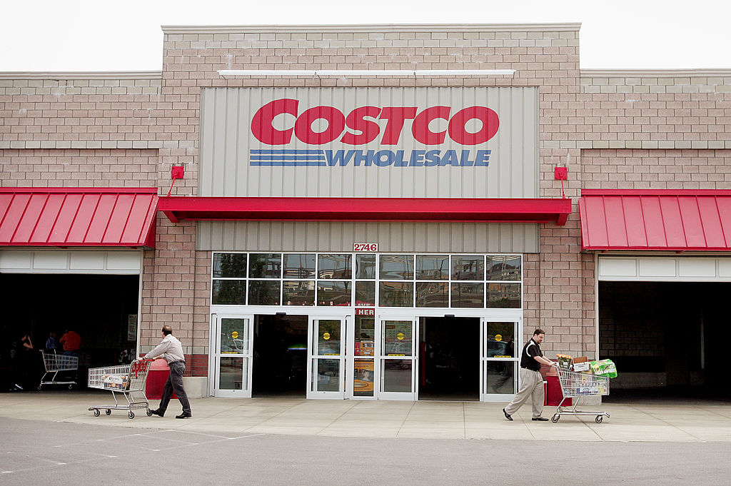 CHICAGO - MAY 26: Shoppers leave the Costco Store May 26, 2005 in Chicago, Illinois. Costco reported today an increase of six percent in third quarter profits over the same period last year. (Photo by Scott Olson/Getty Images)