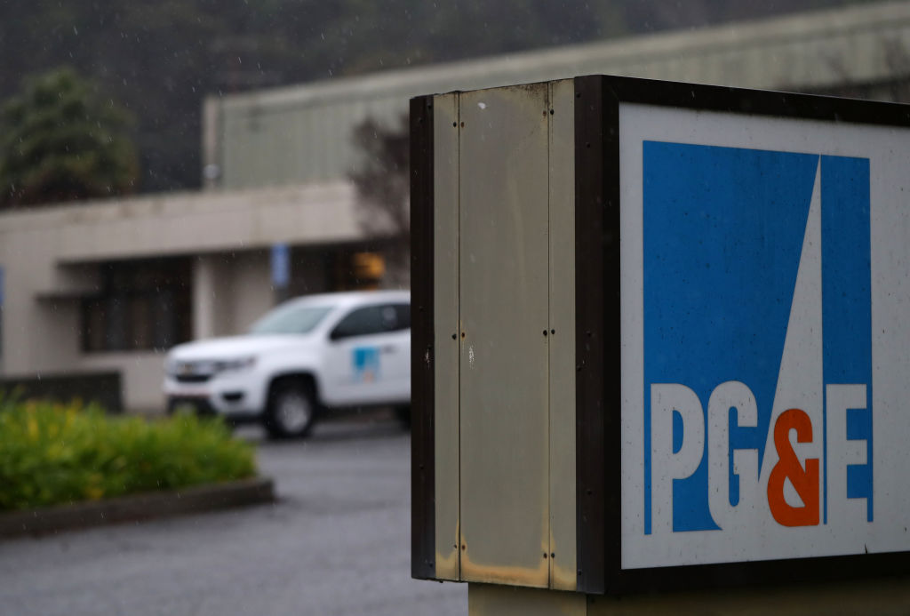 SAN FRANCISCO, CALIFORNIA - JANUARY 15: The Pacific Gas & Electric (PG&E) logo is displayed on a sign in front of the PG&E Service Center on January 15, 2019 in San Rafael, California. PG&E announced that they are preparing to file for bankruptcy at the end of January as they face an estimated $30 billion in legal claims for electrical equipment that might have been responsible for igniting destructive wildfires in California. (Photo by Justin Sullivan/Getty Images)