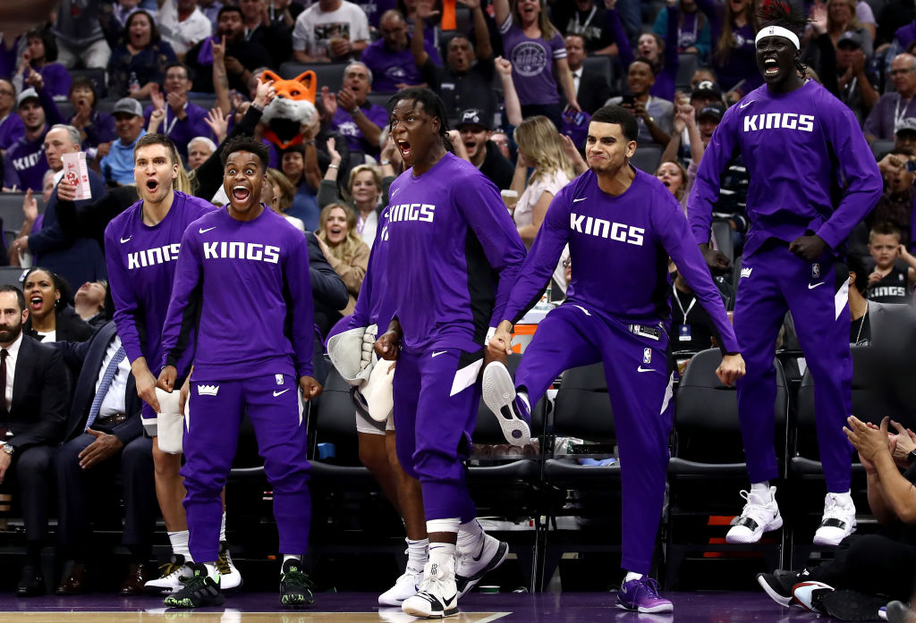 SACRAMENTO, CALIFORNIA - OCTOBER 25: The Sacramento Kings bench reacts after Harrison Barnes #40 dunked the ball against the Portland Trail Blazers at Golden 1 Center on October 25, 2019 in Sacramento, California. NOTE TO USER: User expressly acknowledges and agrees that, by downloading and or using this photograph, User is consenting to the terms and conditions of the Getty Images License Agreement. (Photo by Ezra Shaw/Getty Images)