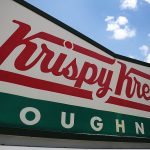 MIAMI, FL - MAY 09: A Krispy Kreme Donuts sign is seen outside of a store on May 09, 2016 in Miami, Florida. JAB Holdings Company, announced it is acquiring Krispy Kreme Donuts in a deal valued at $1.35 billion. (Photo by Joe Raedle/Getty Images)