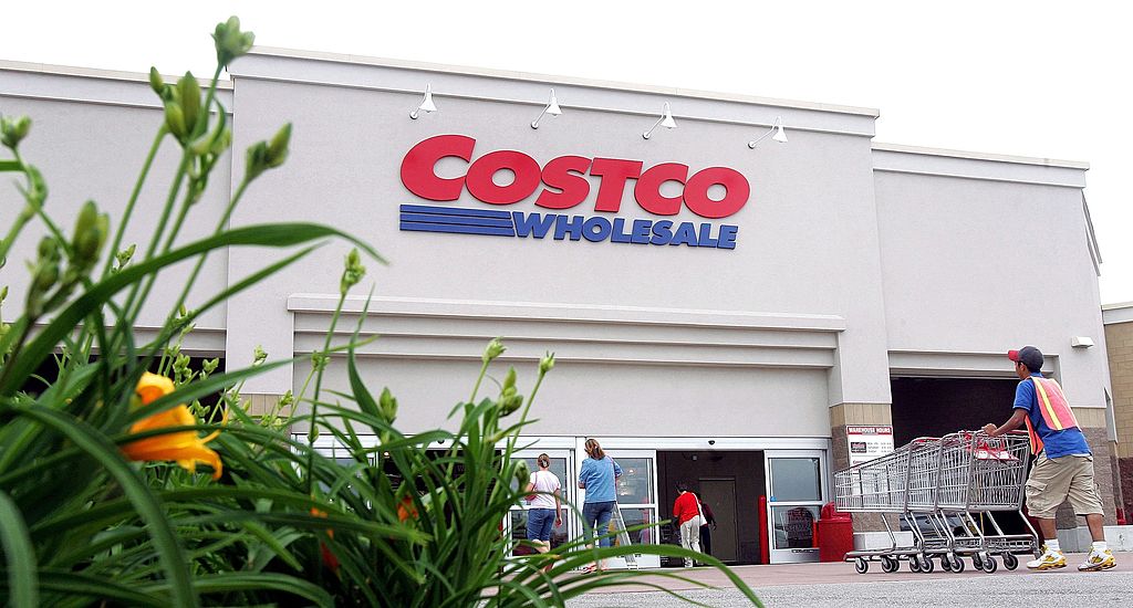 MOUNT PROSPECT, IL - MAY 31: A worker pushes carts outside a Costco Wholesale store May 31, 2006 in Mount Prospect, Illinois. Third-quarter earnings reported today were up at Costco, the nation's largest warehouse club operator, although current oil prices affected margins at their associated gas stations. (Photo by Tim Boyle/Getty Images)