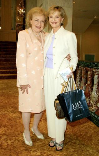 Actress Betty White and actress Florence Henderson model a outfits during the 33rd Annual Celebrity Fashion Show and Auction October 3, 2001 in Beverly Hills, CA. The event benefits the Screen Smart Set Auxiliary of the Motion Picture & Television Fund. (Photo by Frederick M. Brown/Getty Images)